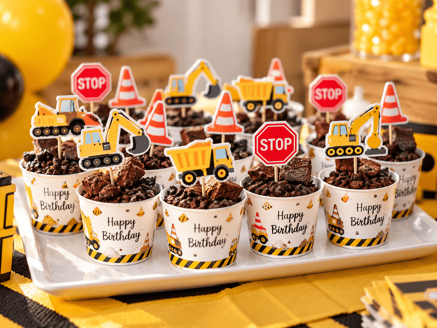 Brownie dirt dessert cups with digger, dump truck, cone and stop sign toppers