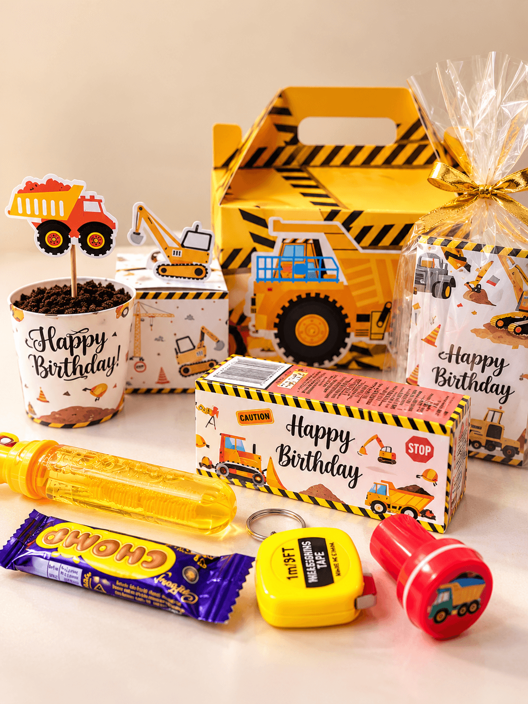 Construction-themed birthday favour boxes, treats and small toys